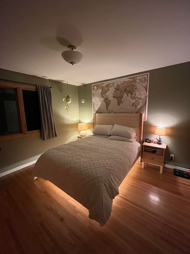 vintage world map above bed